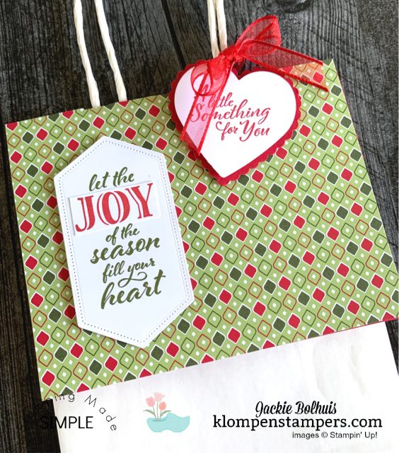 You 'top' your no peek gift bag with a regular greeting card in 'landscape' mode and decorate however you like.