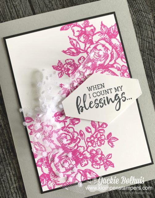 This simple DIY card is stamped with pink flowers and a greeting you can use your favorite craft punch for.