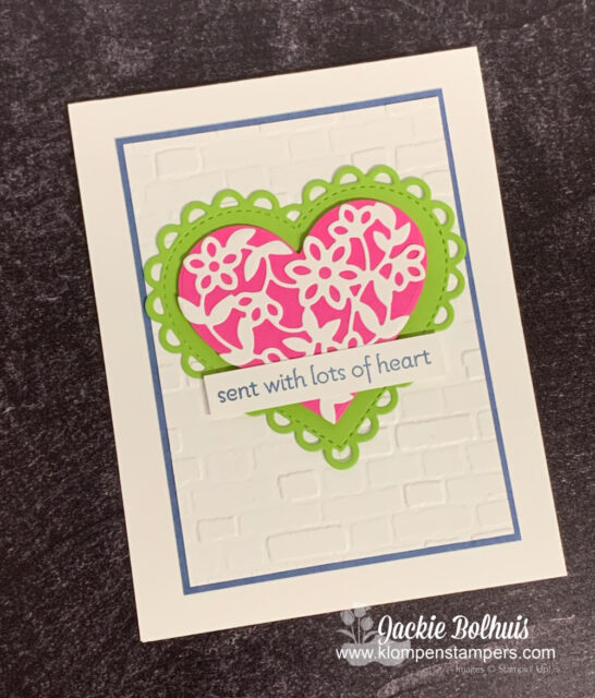 This cutest greeting card starts with a die cut heart and stamped with 'sent with lots of love'