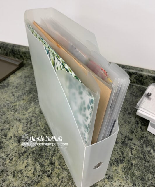 I love storing my scrapbook papers and designer papers in these plastic bins.