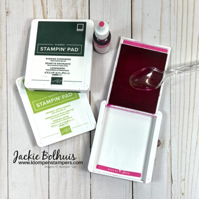 using-a-spoon-to-move-ink-when-you-are-re-inking-a-stamp-set-gives-even-coverage
