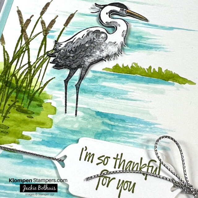 Close-up-of-stamped-Heron-and-watercolor-background-on-handmade-card