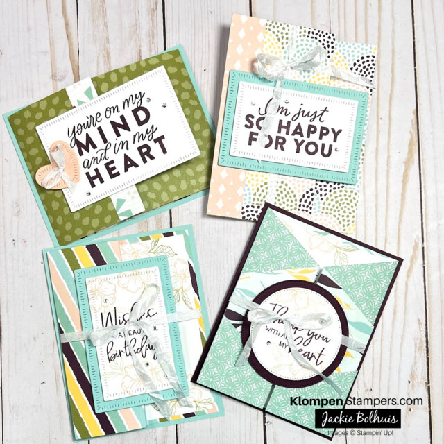 Four different handmade cards lay flat to see the front design of each card. These cards are fun fold cards so they have unique designs. One care is primarily green with a pink heart and reads "you're on my mind and in my heart". The second card is multi-colored polka dots in circle shapes that read "I'm just so happy for you". The third card is multi-colored stripes that read "wishes for a beautiful birthday" and is tied closed with a ribbon. The fourth card is primarily teal and reads "thank you with all my heart" and is tied closed with a ribbon.