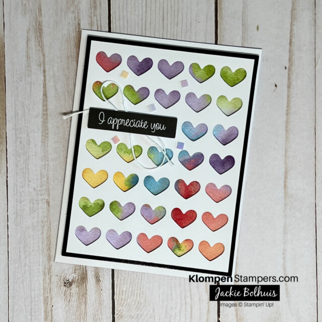 thank you card created with the saying thanks card kit. Card base is a colorful tie-dye and there is a paper overlay on top with cut out hearts. the card reads "i appreciate you"
