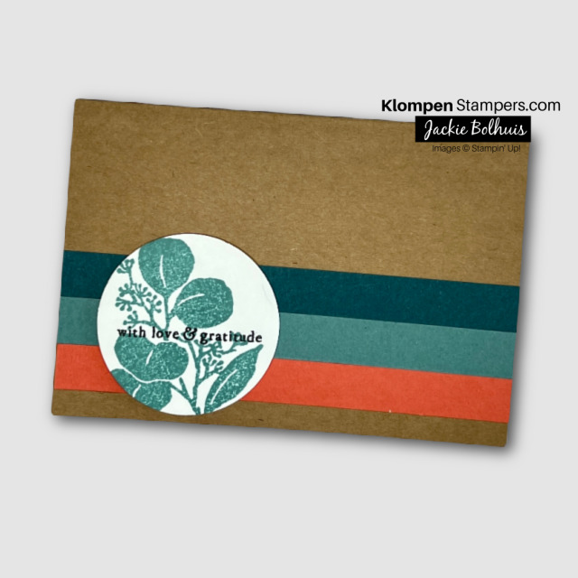 Handmade greeting card designed for any occasion. Simple card with 3 different colored strips and a punched circle lying on top