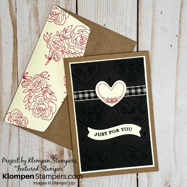 Front of a handmade card designed with the Stampin' Up! stamp set Adoring Hearts, lying on top of it's coordinating envelope.