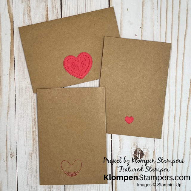 The backside of the three heartfelt handmade cards designed with the Stampin' Up! stamp set Adoring Hearts. Each card has a small heart decal. 
