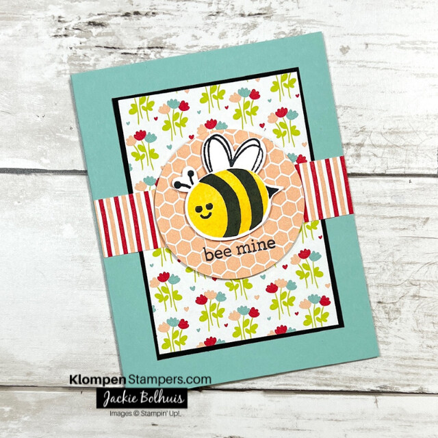 A handmade Valentine's Day card designed with the Stampin' Up! stamp set Bee My Valentine. The card is brightly designed with a happy bumble bee.