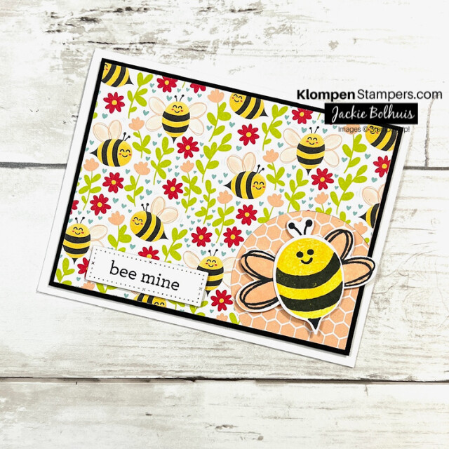 A handmade Valentine's Day card designed with the Stampin' Up! stamp set Bee My Valentine. The card is brightly designed with a happy bumble bee.