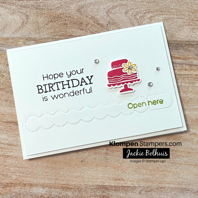 The front of an interactive birthday card that has a pull tab made with the Stampin' Up! stamp set and dies Hooray For Surprises.