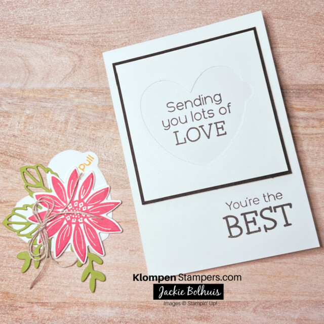 The front of an interactive card where the pull tab was pulled to reveal a hidden message. Card is designed with the Stampin' Up! stamp set and dies Hooray For Surprises.