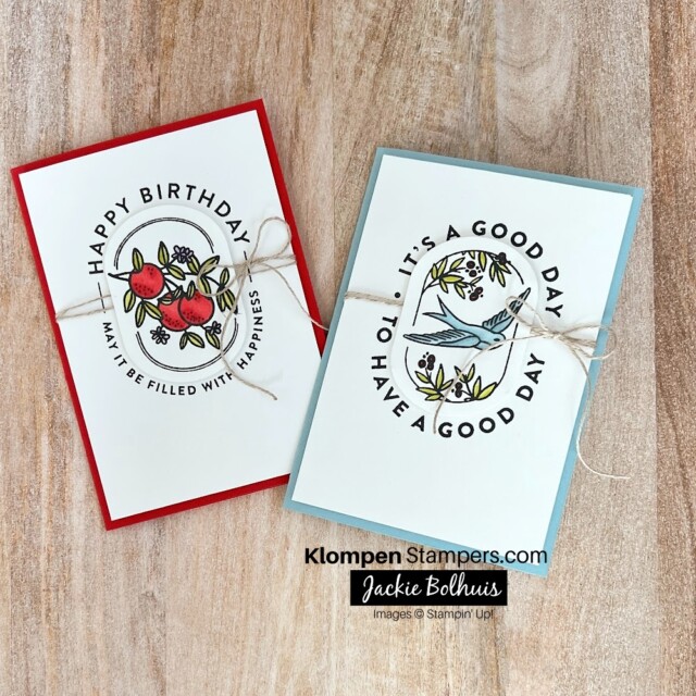 Two handmade cards that were designed from using the same note card layout. The cards look the exact same, but one card is red and the other is blue.