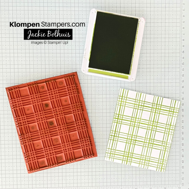 A large background stamp lying on the Stampin' Glass Mat.