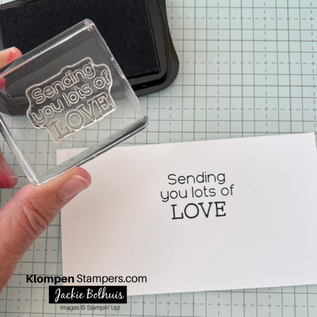 A clean stamped sentiment that reads "sending you lots of love" with the Stampin' Glass Mat underneath. 