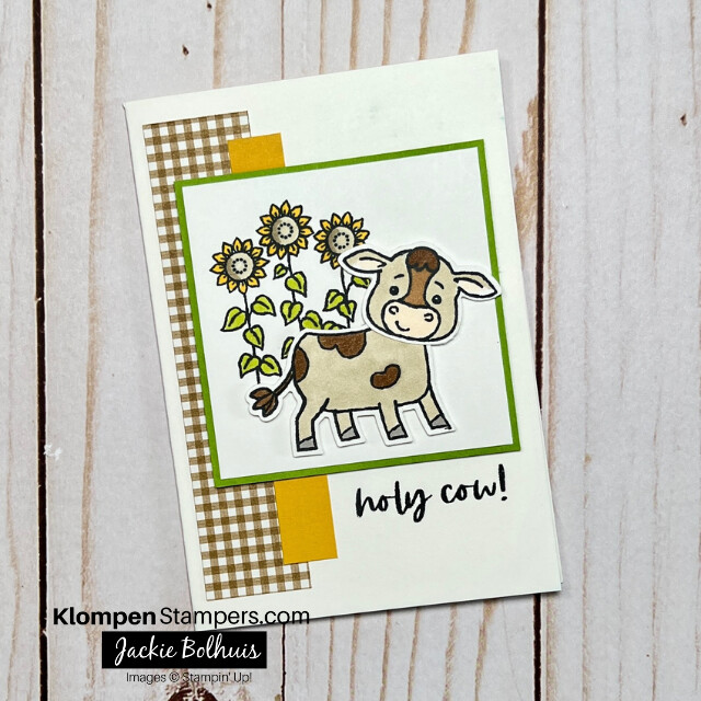 Handmade greeting card that has a brown cow standing in front of three sunflowers, with a greeting that reads "holy cow!" This is a simple card layout and designed with the Stampin' Up! stamp set Cutest Cows.