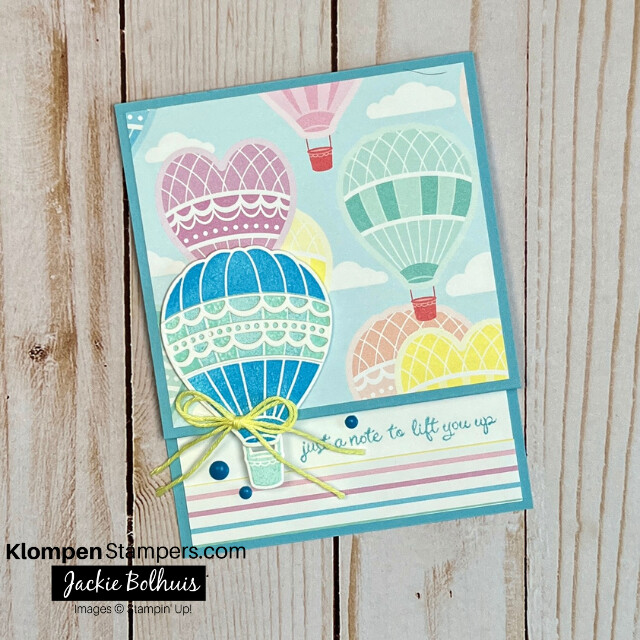 The front of a fun fold card that is designed with the Stampin' Up! stamp set Hot Air Balloon. The card has a stamped sentiment that reads "just a note to life you up."