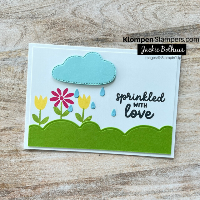 Handmade note card designed with the Stampin' Up! Bright Skies Bundle. Card is designed with a rain cloud raining on flowers and has a sentiment that reads "sprinkled with love".