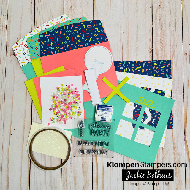 The supplies that comes in the Sampin' Up! Confetti Birthday card kit unpackaged and lying on a table.