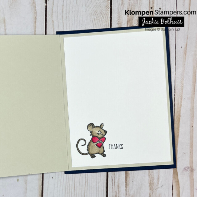 The inside of a handmade card with a brown colored mouse hugging a heart, with a sentiment that reads thanks.