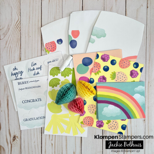 All the supplies that comes in the Hooray for Honeycomb card kit by Stampin' Up! lying on a table.