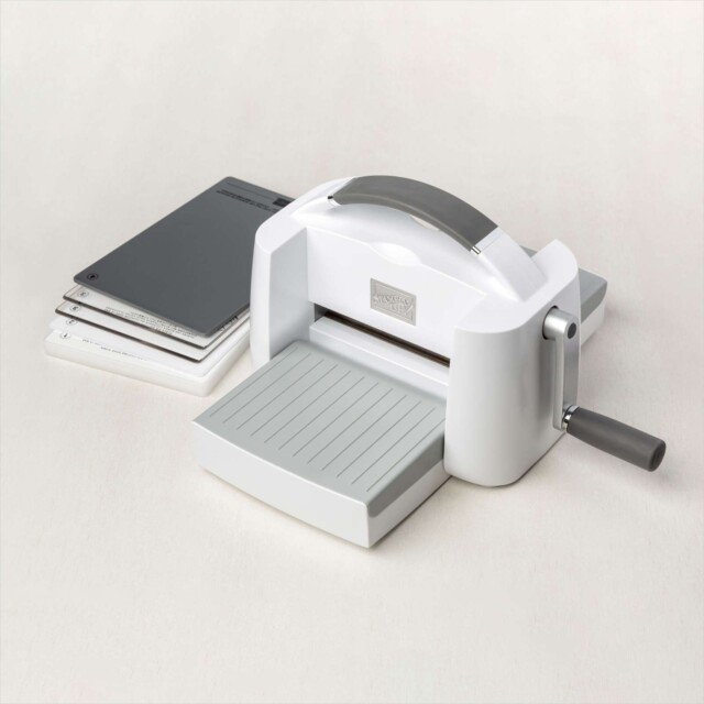 The Stampin' Up! Cut & Emboss Machine with it's sandwich folders.