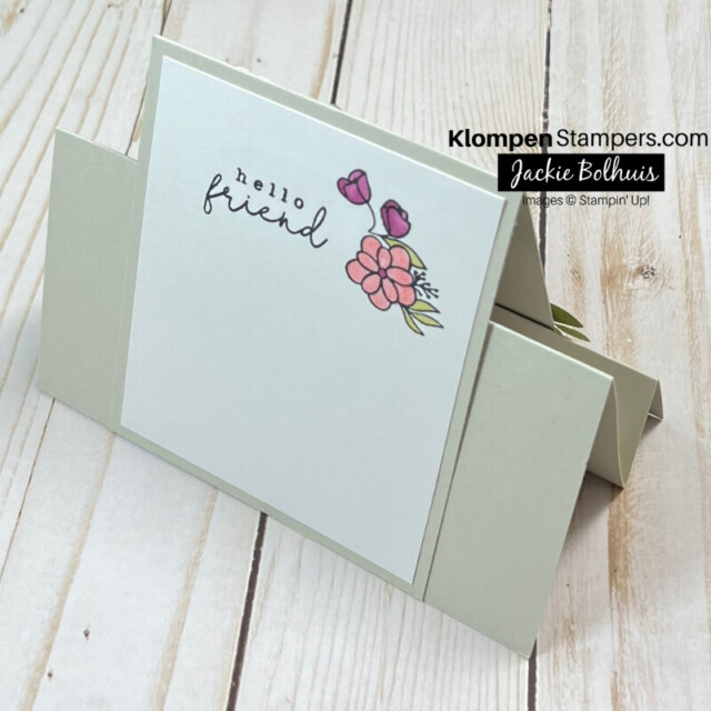 The back of the simple fun fold card layout with a small stamped and colored flower with the greeting "hello friend".