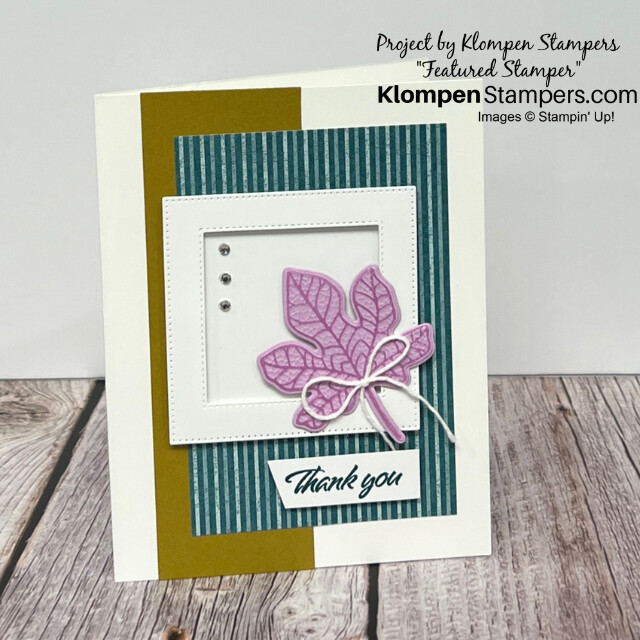 A simple card designed with the Stampin' Up! Changing Leaves Bundle. Card base is white with a large gold strip. There is a green striped layer with a white frame on top. A small textured purple leaf on top of the frame with a small thank you sentiment.