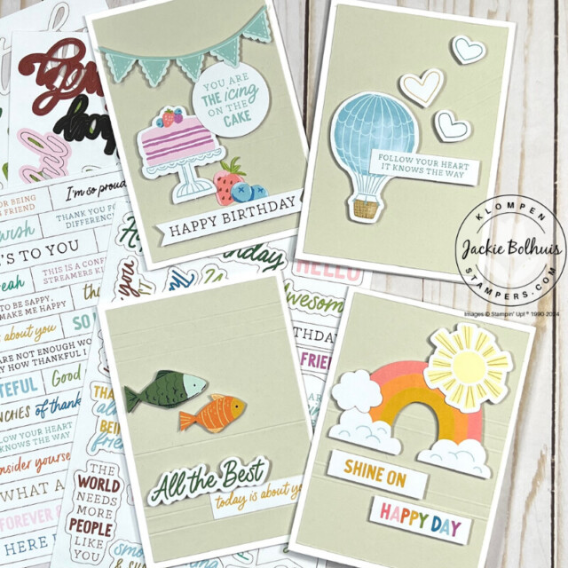 Four cards designed using Basic White Note Cards, a Basic Beige Layer, and the Something For Everything Ephemera Pack and the Saying Something Ephemera Pack. One card has a birthday cake, another a hot air balloon, the third two fish, and finally a card with a rainbow and sun.