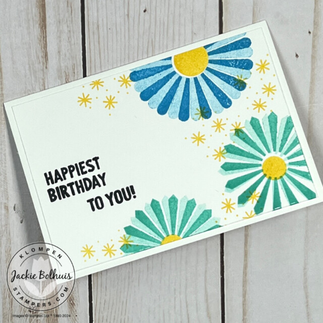 A happy birthday card created only using stamps, ink, and paper. The stamps used are from the stamp set Round We Go, the ink colors are Azure afternoon, Coastal Cabana, Daffodil Delight, and Memento Black, and the paper is Basic White Note Cards and Envelopes.