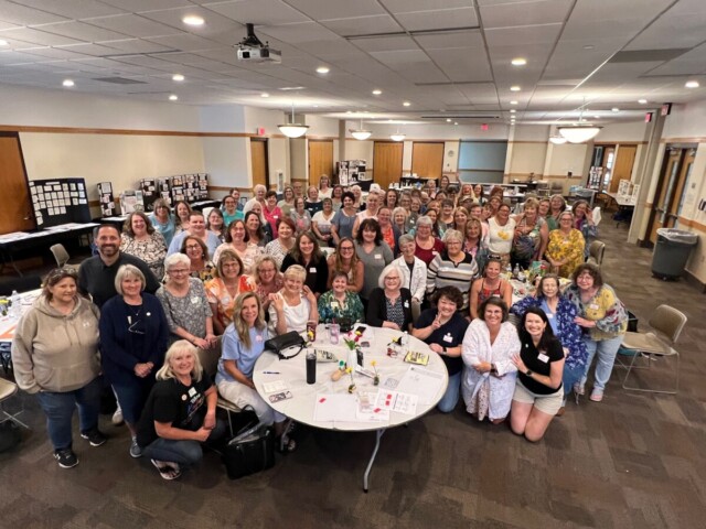 The Klompen Stampers team gathered together for a photo at the Live Klompen Stampers Gathering held August 2024.