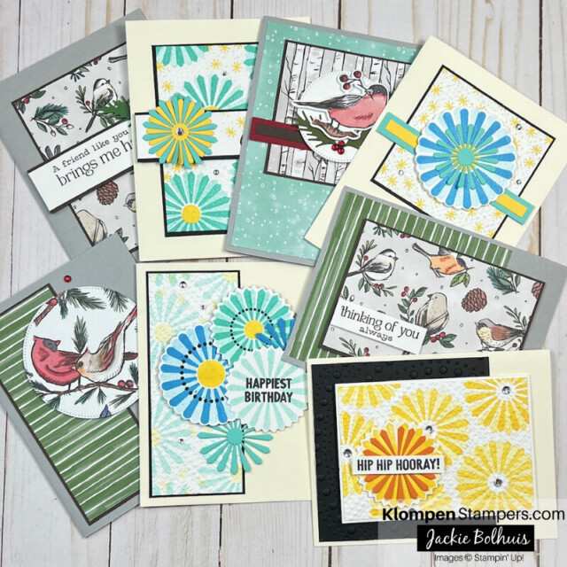 8 handmade cards lying on a table. 4 cards are designed with the Stampin' Up! Round We Go Bundle and the other 4 cards are designed with Wintery Tree Tops stamp set.
