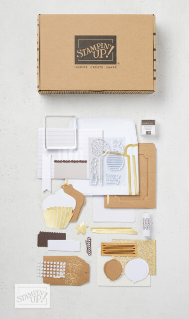 The contents of a Stampin' Up! Card Kit lying on a table. This card kit includes all the supplies needed for making birthday cards.