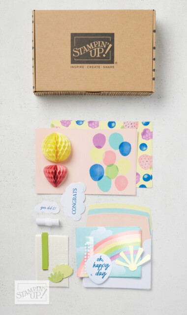The contents of a Stampin' Up! Card Kit lying on a table. This card kit includes all the supplies needed for fun celebration cards with 3D paper honeycombs.
