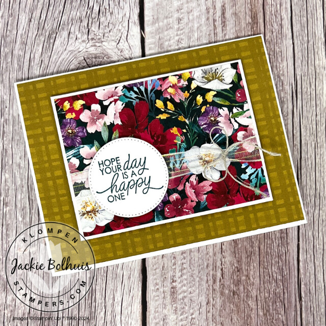 Handmade card designed with the Regal Winter DSP. Card is horizontal with floral paper as it's focal image. Has a stamped sentiment on a die cut circle and small bow.