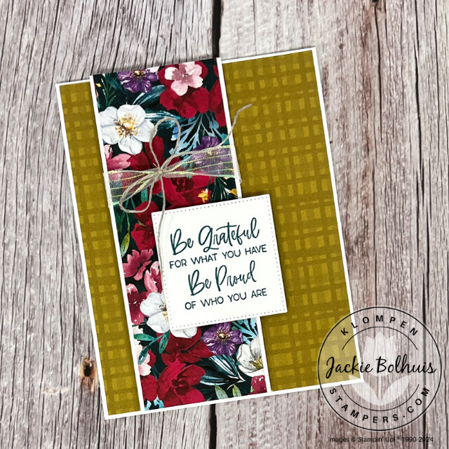 Handmade card designed with the Regal Winter DSP. Card is vertical with a floral paper strip as it's focal image. Has a stamped sentiment and small bow.