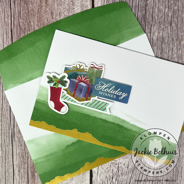 Christmas card designed with the Stampin' Up! Mix & Match products Gold Dipped Cards & Envelopes, Joyful Images Ephemera Pack, and Joyful Sayings Ephemera Pack. Card has a small stocking and presents on it.