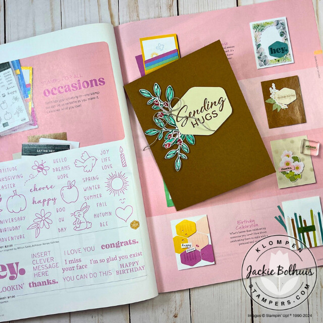 A handmade card lying on top of the Stampin' Up! catalog with the page open to a card example wich inspired the making of the handmade card.