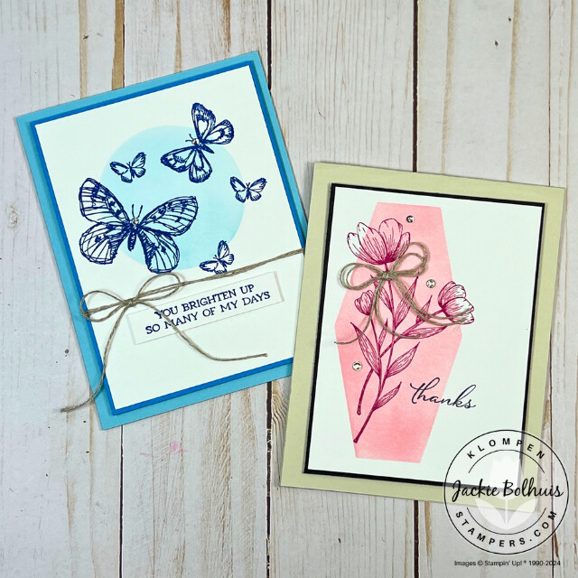 Two completed cards that use the masking technique with blending brushes. One card is different shades of blue with stamped butterflies. The other card is shades of pink with a stamped flower.