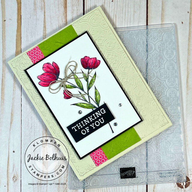 Handmade card created in Card Making 201, Class 5: Stampin' Cut & Emboss Machine, to show how to use the machine to emboss layers. Card is a thinking of you card with a stamped flower image and has an embossed background layer with an embossed green background strip.