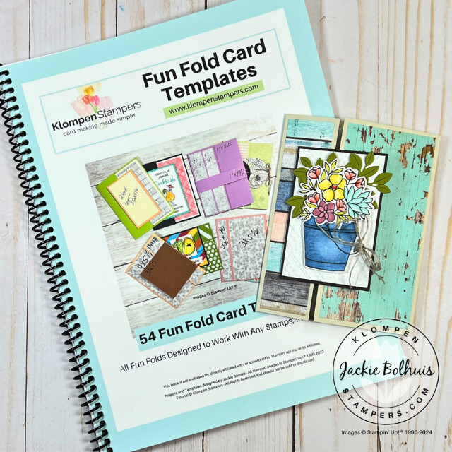 Handmade fun fold card lying on top of a Fun Fold Card Templates resource book.