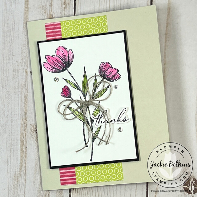 Handmade card shared in Card Making 201, Class 2 to show a completed card created by using a watercolor technique to color the stamped floral image.