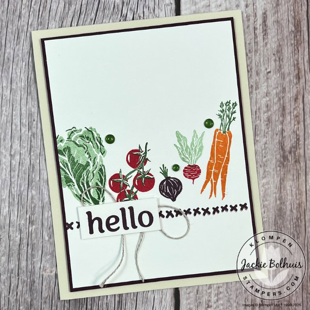 A handmade card with the sentiment "hello" and stamped vegetables for a focal image.