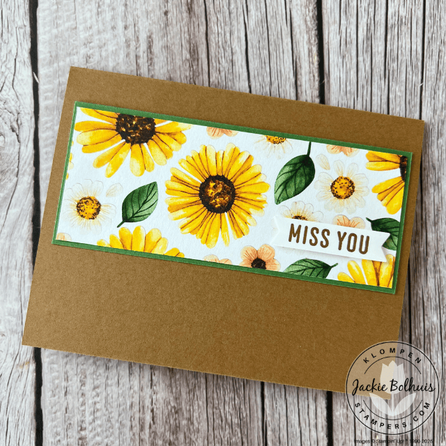 Handmade card designed with the Floral Impressions DSP.  The card is horizontal with floral paper as it's focal point with a hand stamped sentiment. 