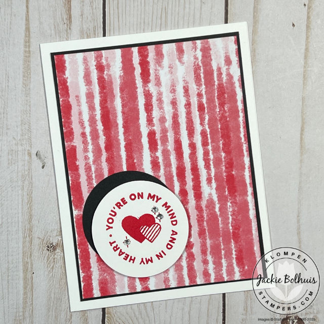 Elegant card showcasing a white circle punch focal point with a stamped image from Encircled With Love, layered over patterned Designer Series Paper.