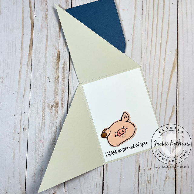 Open view of Party Piggy fun fold card showcasing interactive fold and stamped sentiment.