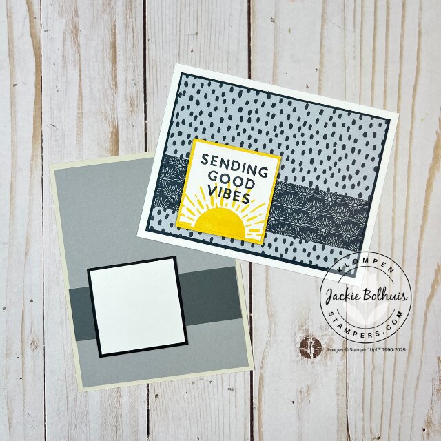 Close-up of one completed card laying on top of the template, highlighting stamped images and embossed background.