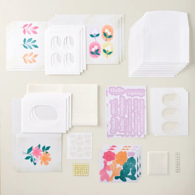 Lots to Love craft kit supplies laid out, showing card bases, precut pieces, and embellishments