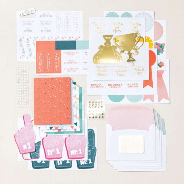 Contents of the Stampin’ Up! Best Ever Kit including precut pieces, gold foil accents, envelopes, and adhesive