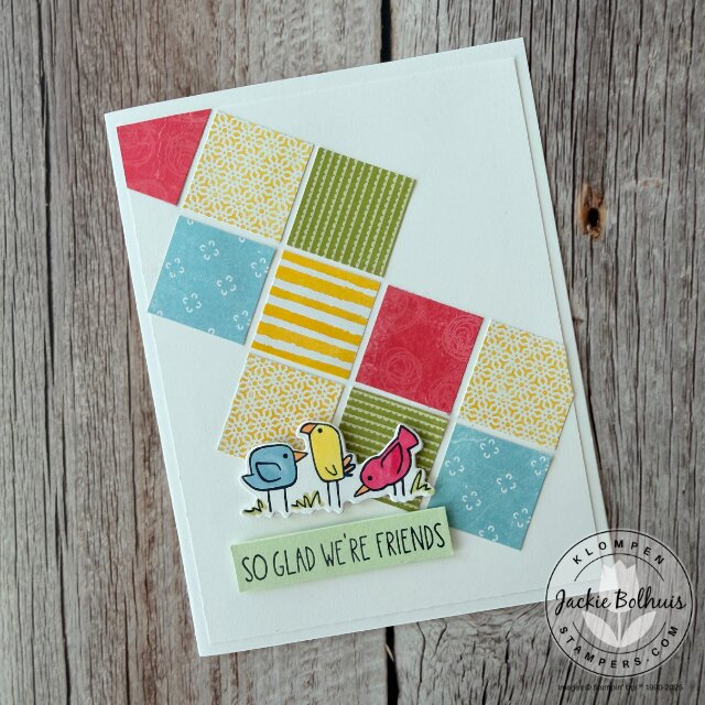 Finished handmade card demonstrated in the video using the easy scrap paper grid template and stamped focal image.