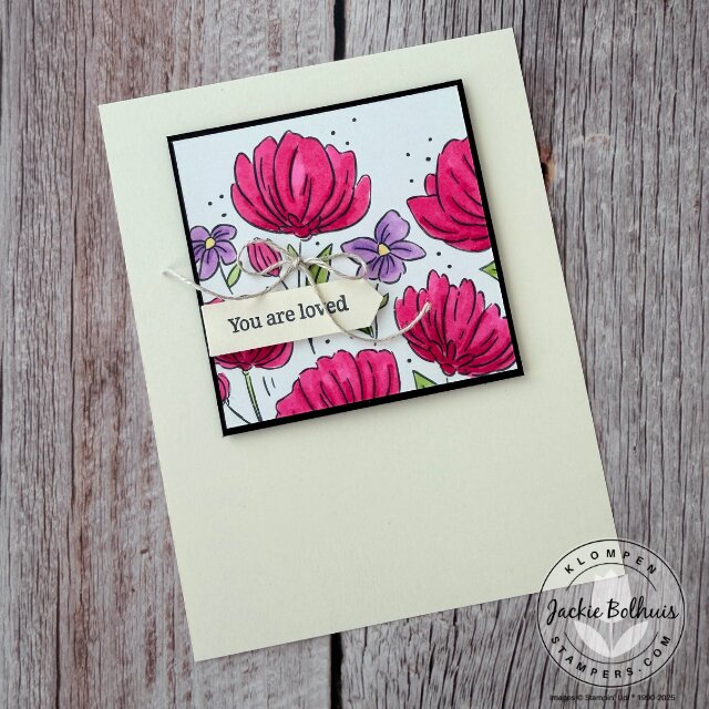 Handmade floral card using the Flowers Fair stamp set with a layered sentiment banner and detailed embossed flower design.